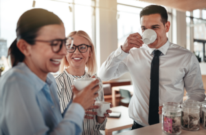 employees enjoying coffee together in the office